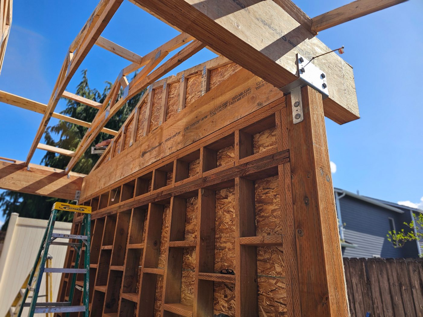 Wall framing and beam connection