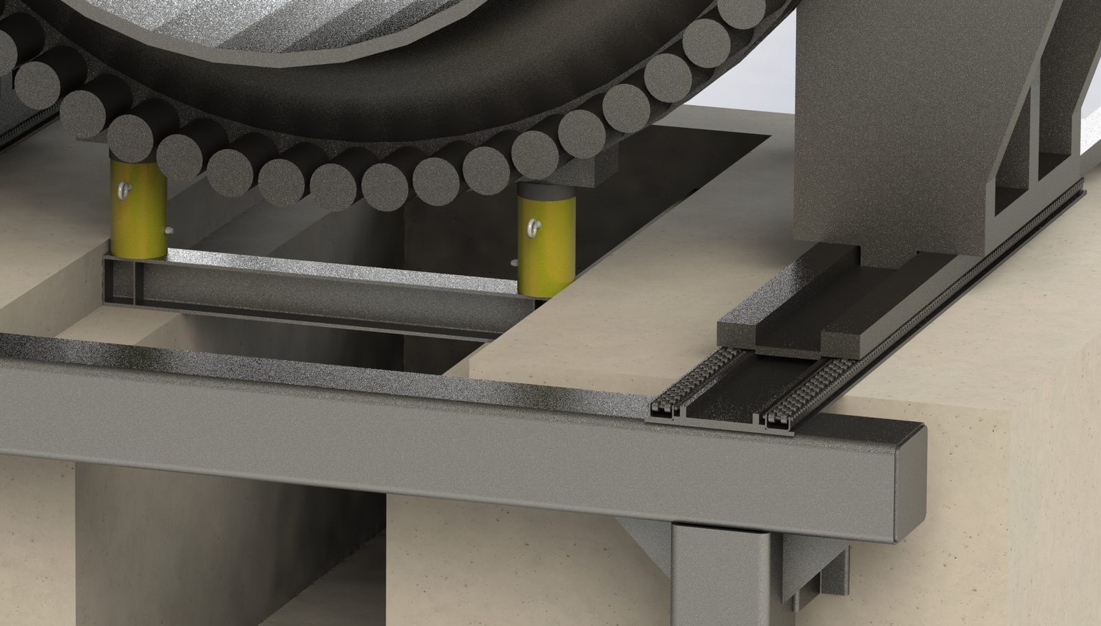 Close-up of the 100-ton hydraulic jacks under the valve next to the roller rails
